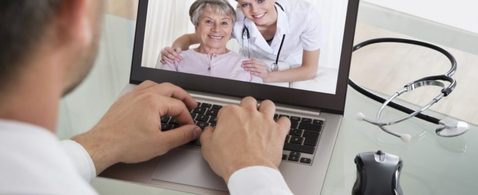 Doctor Video Chatting With Nurse And Patient